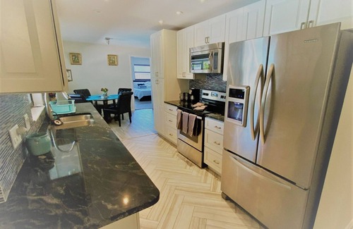 Interchange Square House | Space Coast 4 Bedroom Hot Tub and Pool Getaway - 10 min to beach!