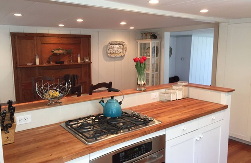 Provincetown Condo | Spacious 2-Bedroom Retreat in West End with Long Point Views & Stunning Garden.
