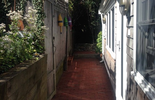 Provincetown Condo | Spacious 2-Bedroom Retreat in West End with Long Point Views & Stunning Garden.