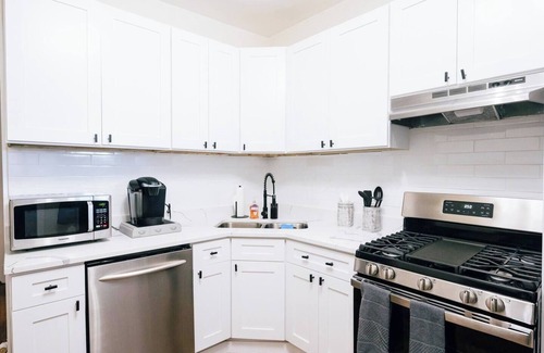 Logan Square Apartment | Spacious 3-bedroom retreat in West Logan with modern amenities, perfect for families looking to relax and explore vibrant Logan Square.