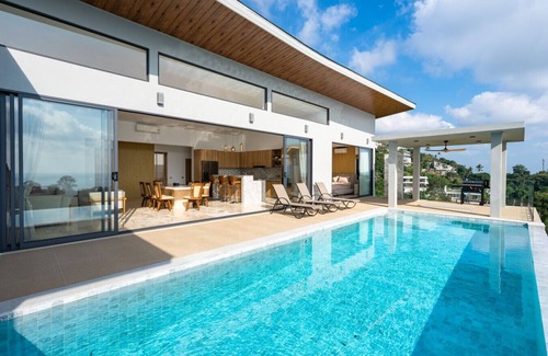 Maret House | spacious and stylish 4-bedroom private pool villa nestled in the scenic hills of Chaweng Noi.