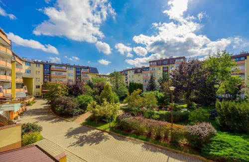 Bielany Apartment | Spacious Apartment with Parking by Noclegi Renters