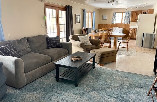 Wautoma Cabin | Spacious cabin on tranquil lake with kayaking, fishing. Arcade games, pool table