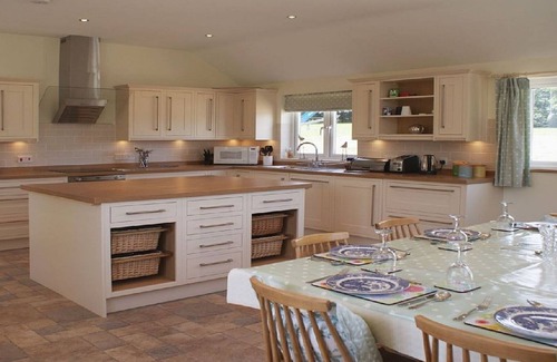 St Teath Cottage | Spacious farmhouse with large childrens play area and fabulous family kitchen.