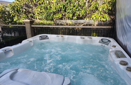 Northland House | Spacious four bedroom home with Private Hot Tub, Heated Pool & Tennis Court.
