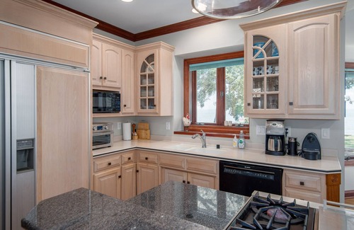 Oshkosh House | Spacious Home on the Water with Indoor Pool and Room For Everyone!