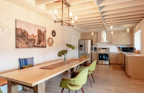 Roseville Apartment | Spacious modern loft with a city view.