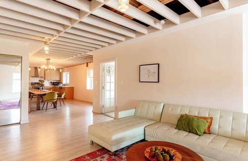 Roseville Apartment | Spacious modern loft with a city view.