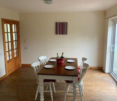 Gorslas House | Spacious romantic party cottage with log burner and Ultrafast Fibre near pub Pet friendly