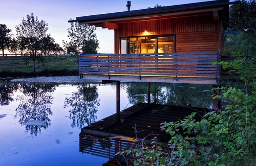 Buhlau Apartment | Spectacular TinyHouse on steel pillars in the horse pond - with wood-burning sto