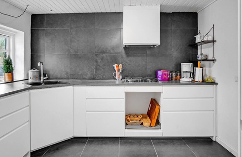 Grenaa House | Spend a nice vacation in this cozy cottage with views over the countryside and large private garden.