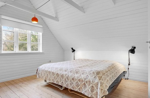 Grenaa House | Spend a nice vacation in this cozy cottage with views over the countryside and large private garden.