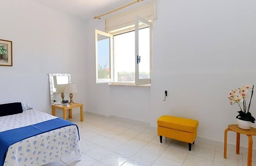 Alezio House | Spend a relaxing vacation in this inviting vacation home.