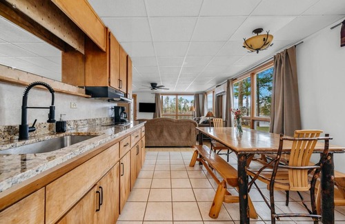 Mayfield Condo | Spider Lakefront Balcony| Pontoon Rentals| Bonfire