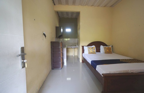 Mojokerto Hotel | SPOT ON 93612 Kencana Homestay Syariah Near Masjid AL-BAROKAH Kanyuran