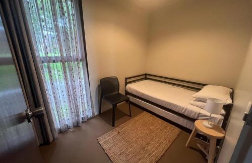 Stanmore Bay House | Stanmore Bay Log Cabin - short walk to beach