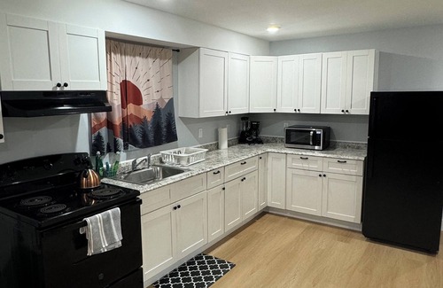 Irvington Apartment | Step into Serenity 3-bedroom apartment Entrance is on the side of the building.