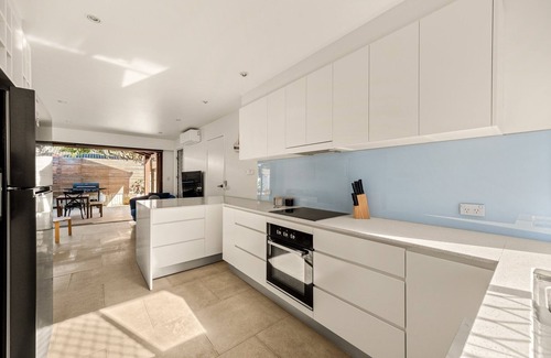 Palm Beach House | Steps from Sand: 2-Bed Beach Escape with Courtyard