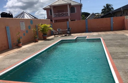 Bon Accord Village Apartment | Store Bay Suite at Goodheart's Comfort Inn