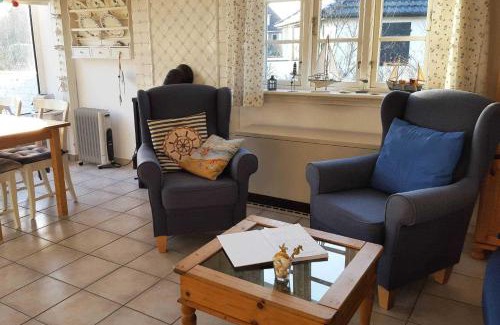 Goting House | Strandhaus mit Kaminofen Bungalow