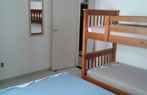 Canto do Forte Apartment | Street faces the fish boutique, two blocks from the beach,