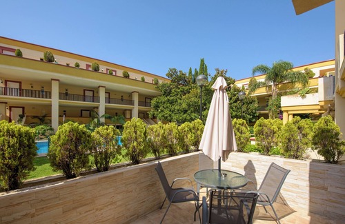Nikki Beach Apartment | Studio Apartment 'Romana Playa 203' with Pool, Private Terrace & Wi-Fi