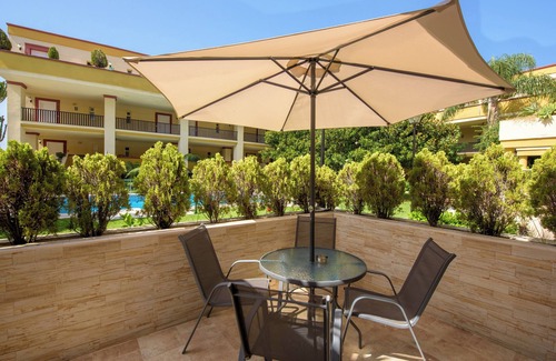 Nikki Beach Apartment | Studio Apartment 'Romana Playa 203' with Pool, Private Terrace & Wi-Fi