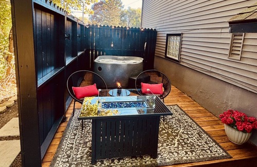 Fayetteville Condo | Studio with Hot Tub, Fire Table & Private Deck!