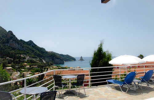 Agios Gordios Apartment | Studio with sea view, balcony, kitchenette, a/c, safe box