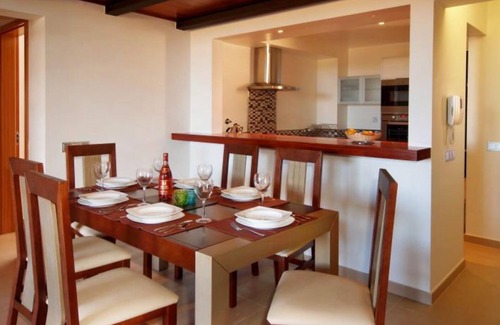 Praia da Luz Apartment | Stunning 2 Bedroom Apartment with Hot tub and Sea View on 5* Spa Resort.