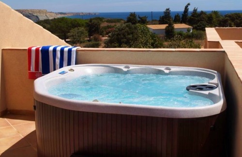 Praia da Luz Apartment | Stunning 2 Bedroom Apartment with Hot tub and Sea View on 5* Spa Resort.