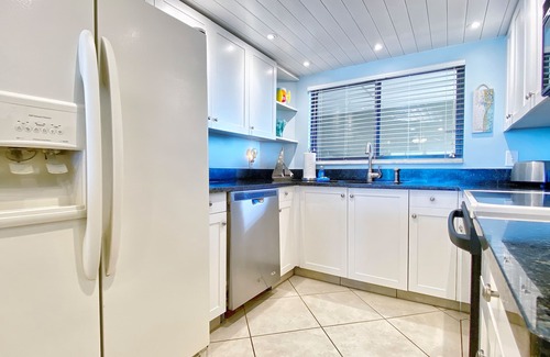 Sand Key Condo | Stunning beachfront escape with heated pool, hot tub & Gulf-view balcony