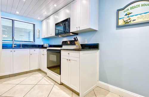 Sand Key Condo | Stunning beachfront escape with heated pool, hot tub & Gulf-view balcony