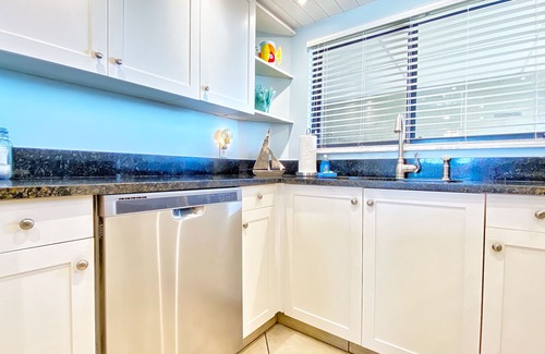 Sand Key Condo | Stunning beachfront escape with heated pool, hot tub & Gulf-view balcony