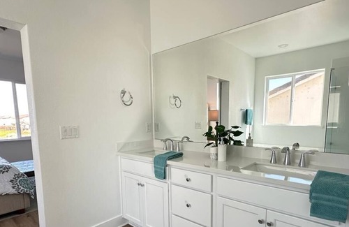 Lathrop Villa | Stunning Brand New Home on a Lake in an incredible neighborhood