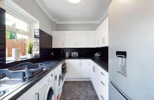 Wigan Apartment | Stunning Family Home with Comfortable Surroundings by Our Home Short Stays ideally situated within Greater Manchester