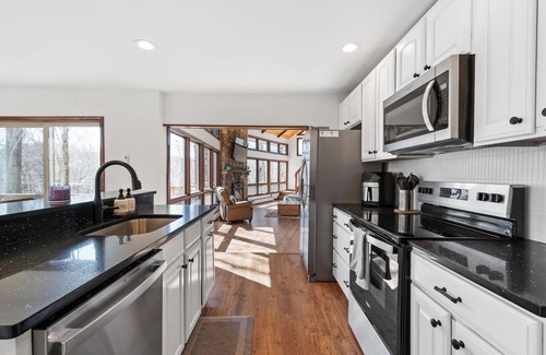 Gouldsboro House | Stunning House on River with Hot Tub and Game Room in Big Bass Lake w/Amenities!
