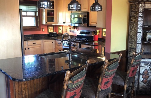 Lake Placid House | Stunning Lake Placid family friendly cozy wooded townhome minutes from town