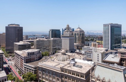Downtown Oakland Apartment | Stunning Oakland 2BR w/ AC, W/D, Sky Deck, next to BART, by Blueground