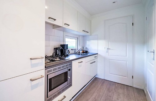 Dordtse Biesbosch House | Stunning private villa for 4 people with pool, WIFI, TV, terrace and parking