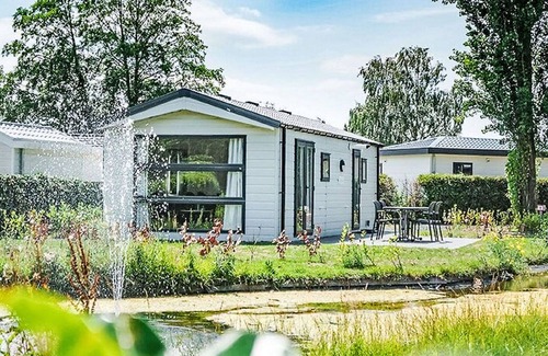 Dordtse Biesbosch House | Stunning private villa for 4 people with pool, WIFI, TV, terrace and parking