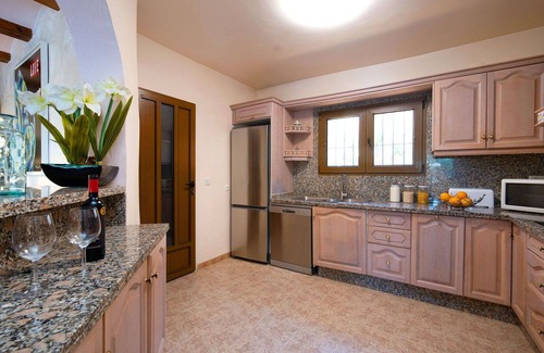 Urbanitzacio la Fustera Villa | Stunning private villa with WIFI, A/C, hot tub, private pool, TV, patio and pets allowed