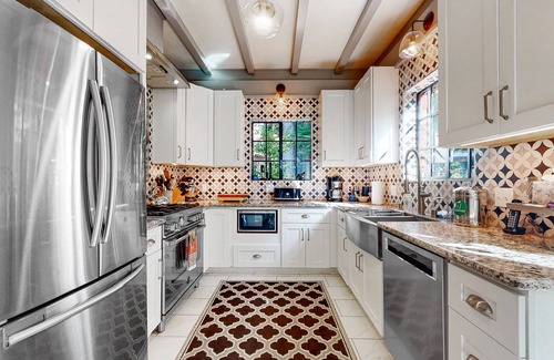 Northwood House | Stunning riverfront estate with hot tub, dock, & fireplace - dog-friendly
