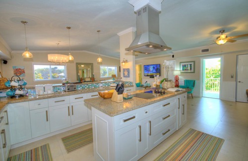 Anglers Park House | Stunning Three Level House on Key Largo Canal with a heated pool and roof deck.