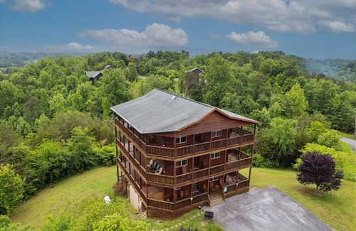 Sevierville Cabin | Stunning views! 6-bedroom cabin w/arcade, pool table, hot tub, foosball & more!