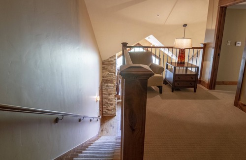 Tamarack Condo | Stunning Wood Interior Design |Natural Stone Propane Fireplace | Private Patio