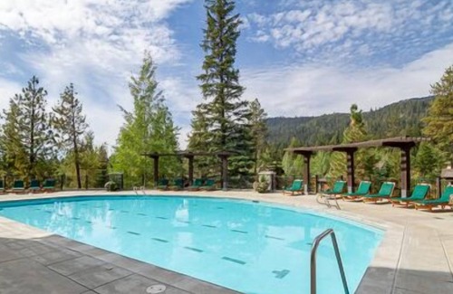 Tamarack Condo | Stunning Wood Interior Design |Natural Stone Propane Fireplace | Private Patio