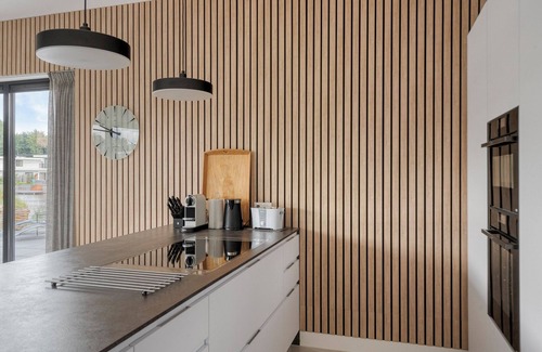 Zeewolde House | Stylish detached 6-person villa with private sauna, three en-suite bathrooms and private dock on the water