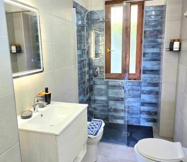 Solanas Apartment | Stylish home with patio 4 min walk to the beach