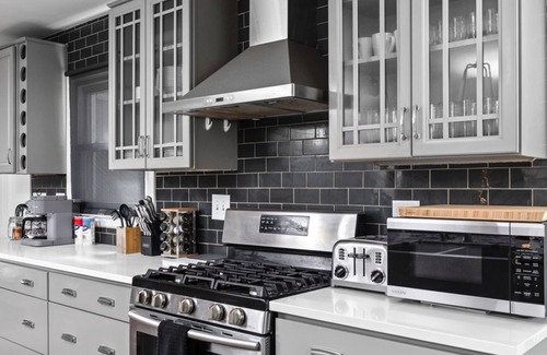 Indianapolis House | Stylish Indy Retreat w/Heated Saltwater Pool/Games/Fire Pits, Sleeps 12